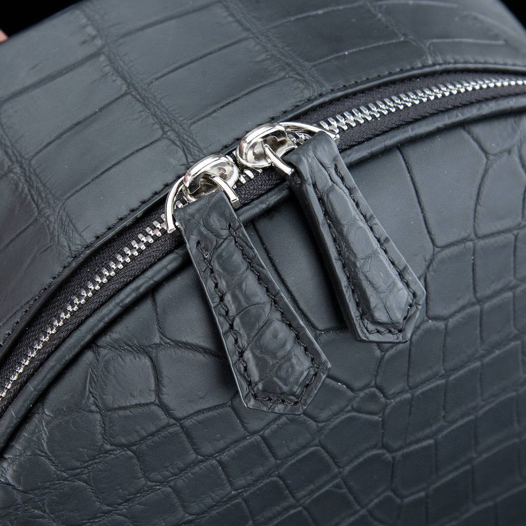 Large black crocodile leather backpack by Rossie Viren, featuring a matte finish and spacious design for men.