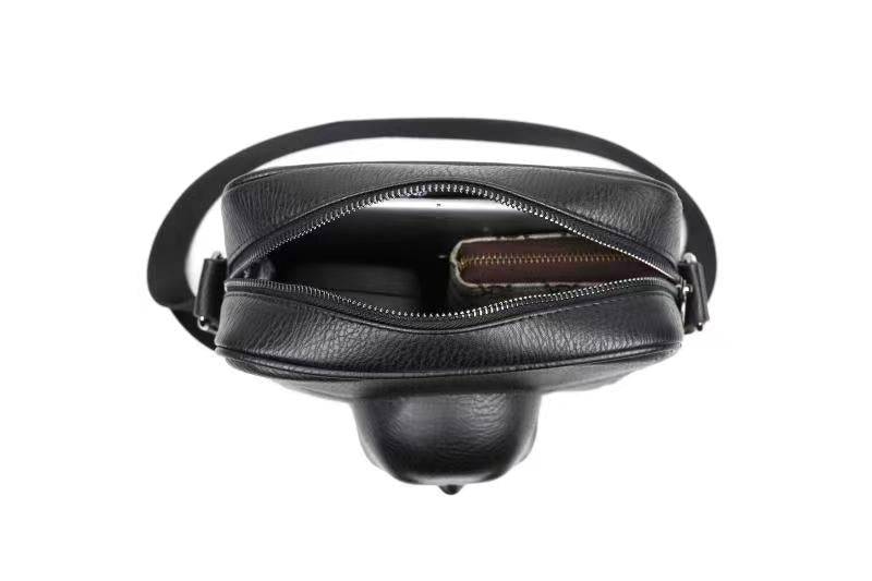 Black 3D skull design messenger shoulder bag for men by Rossie Viren, featuring a stylish and functional accessory.
