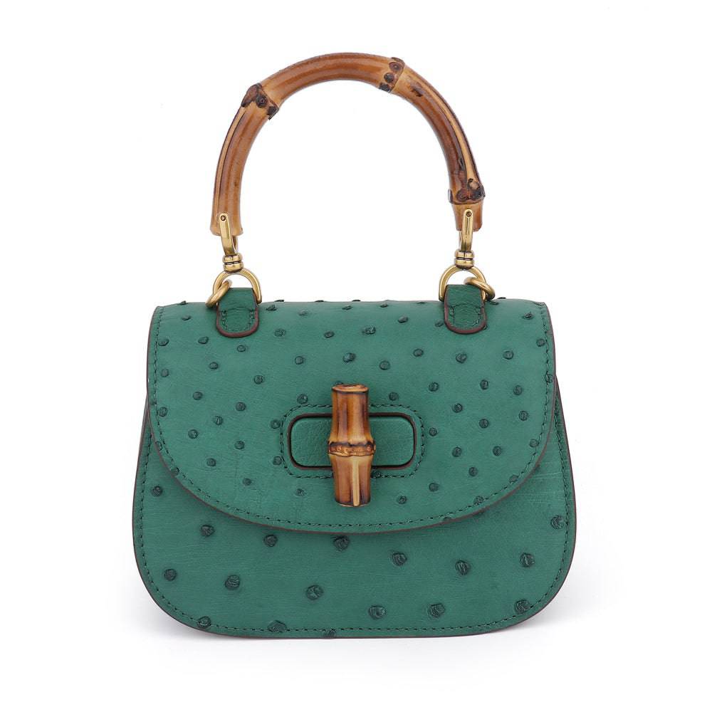 Rossie Viren ostrich leather nano bamboo top handle crossbody bag with structured design and adjustable strap.