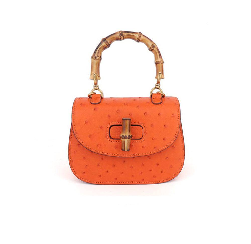 Rossie Viren ostrich leather nano bamboo top handle crossbody handbag with sleek design and adjustable strap.