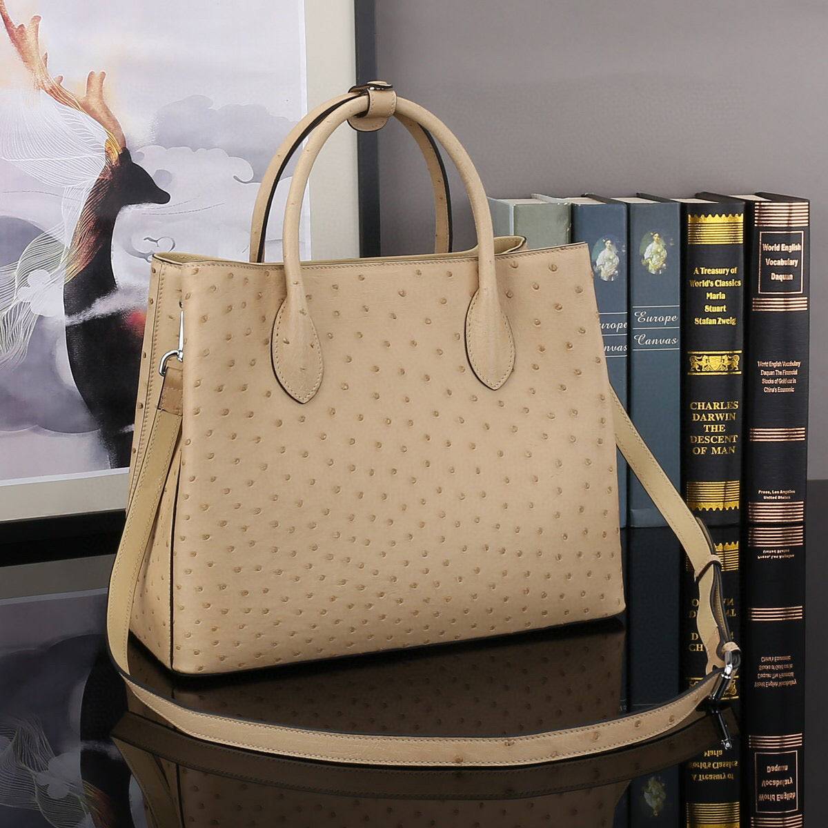 Rossie Viren ostrich leather handbag with top handle and shoulder strap, 32cm size, stylish and textured design.