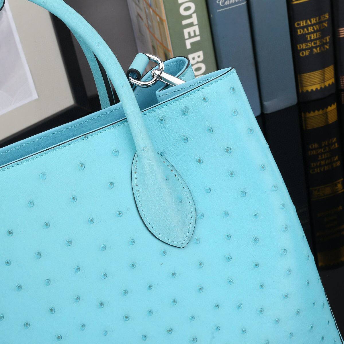 Blue Ostrich Leather Top Handle Shoulder Bag by Rossie Viren, 32cm handbag with elegant top handle and textured ostrich finish.