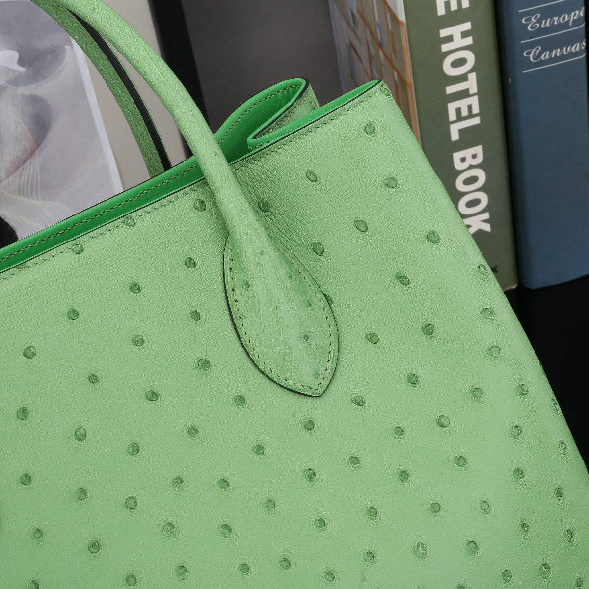 Green ostrich leather top handle shoulder bag by Rossie Viren, 32cm handbag with textured exotic leather finish.