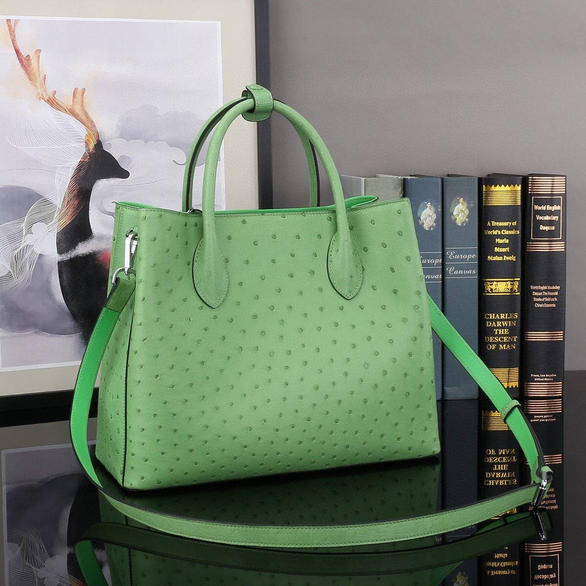Green ostrich leather top handle shoulder bag by Rossie Viren, 32cm handbag with elegant design and textured leather finish.