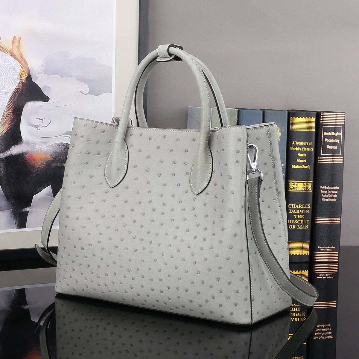 Grey ostrich leather top handle shoulder bag by Rossie Viren, 32cm handbag with elegant textured finish.