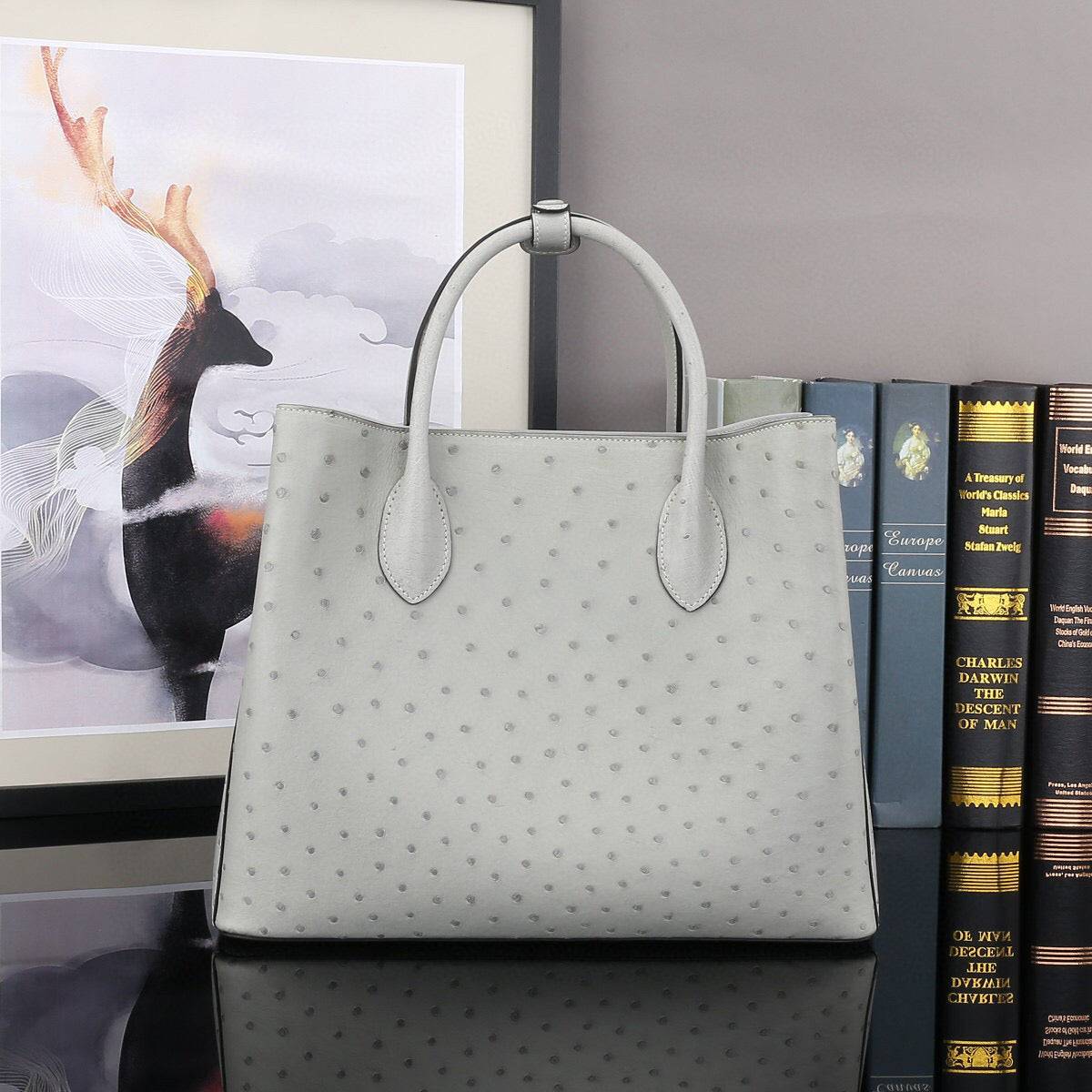 Grey ostrich leather top handle shoulder handbag by Rossie Viren, 32cm with elegant design and detailed texture.
