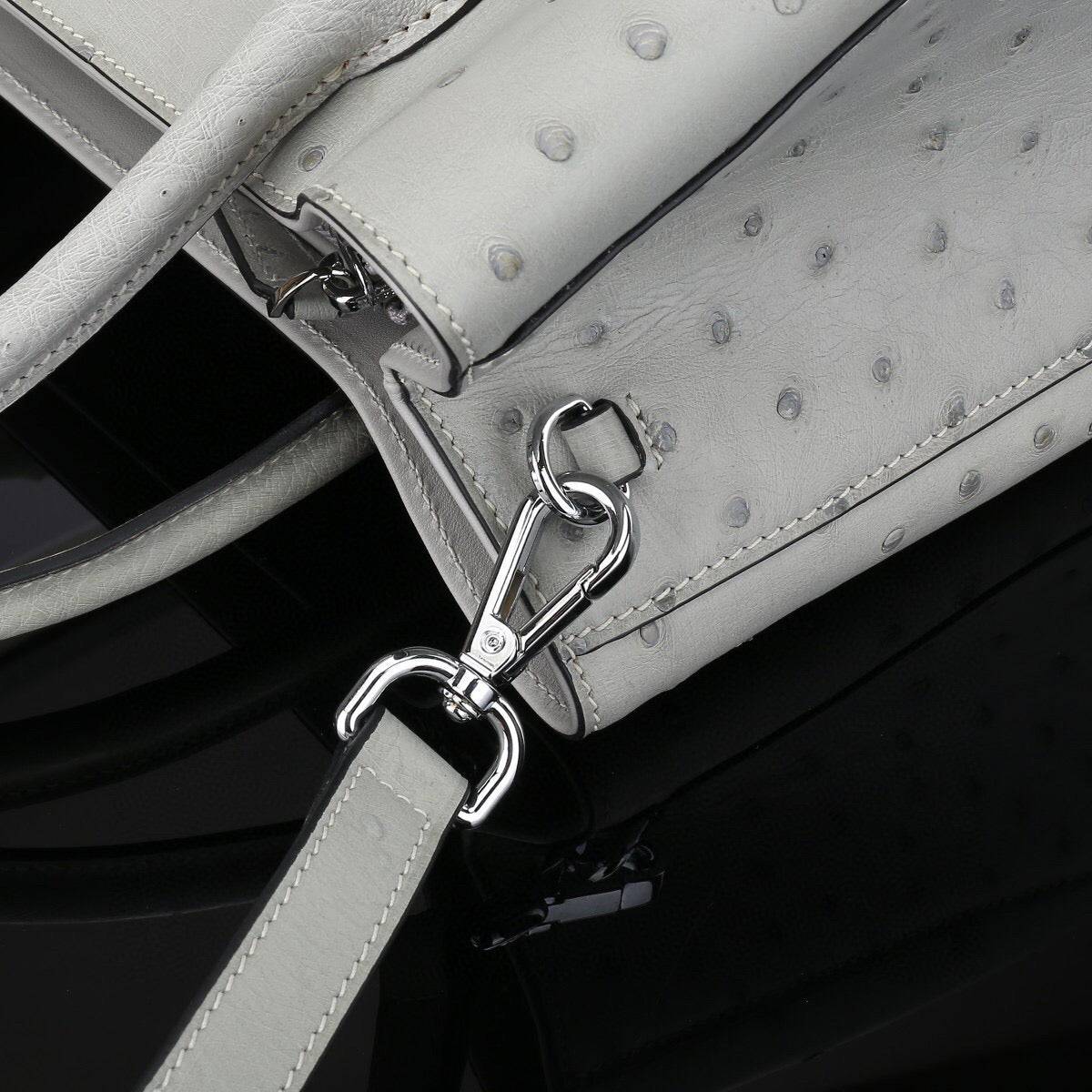 Grey Rossie Viren ostrich leather top handle shoulder bag, 32cm handbag with elegant design and textured finish.