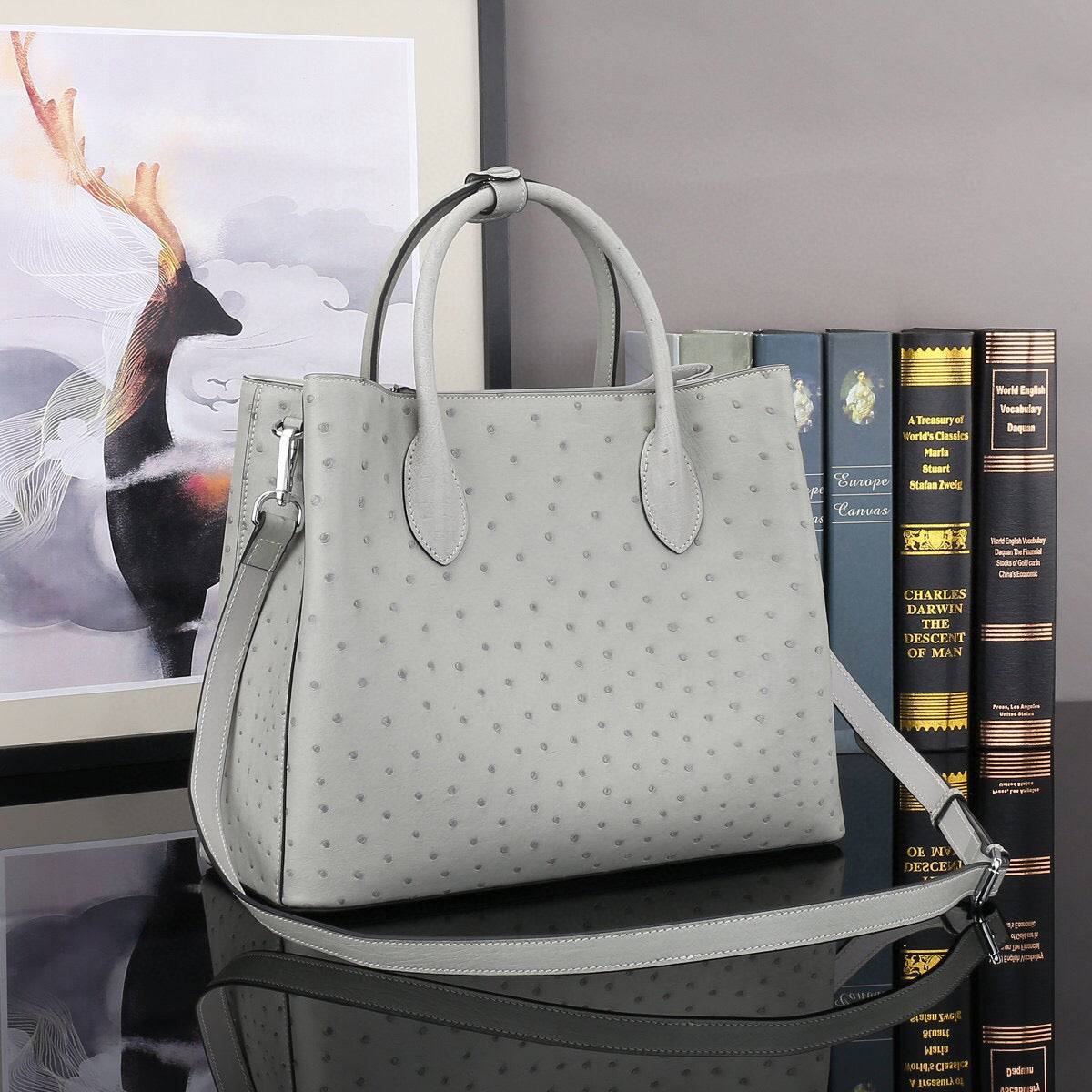 Grey ostrich leather top handle shoulder bag by Rossie Viren, 32cm handbag with elegant textured finish.
