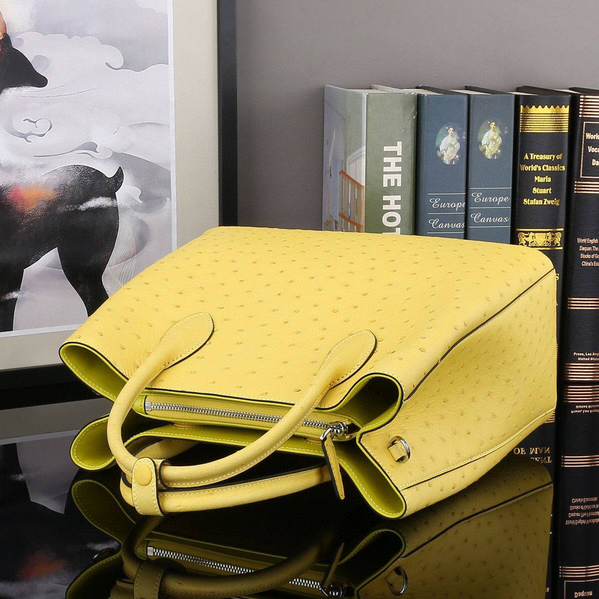 Yellow Rossie Viren ostrich leather top handle shoulder bag, 32cm handbag with elegant design and textured leather finish.