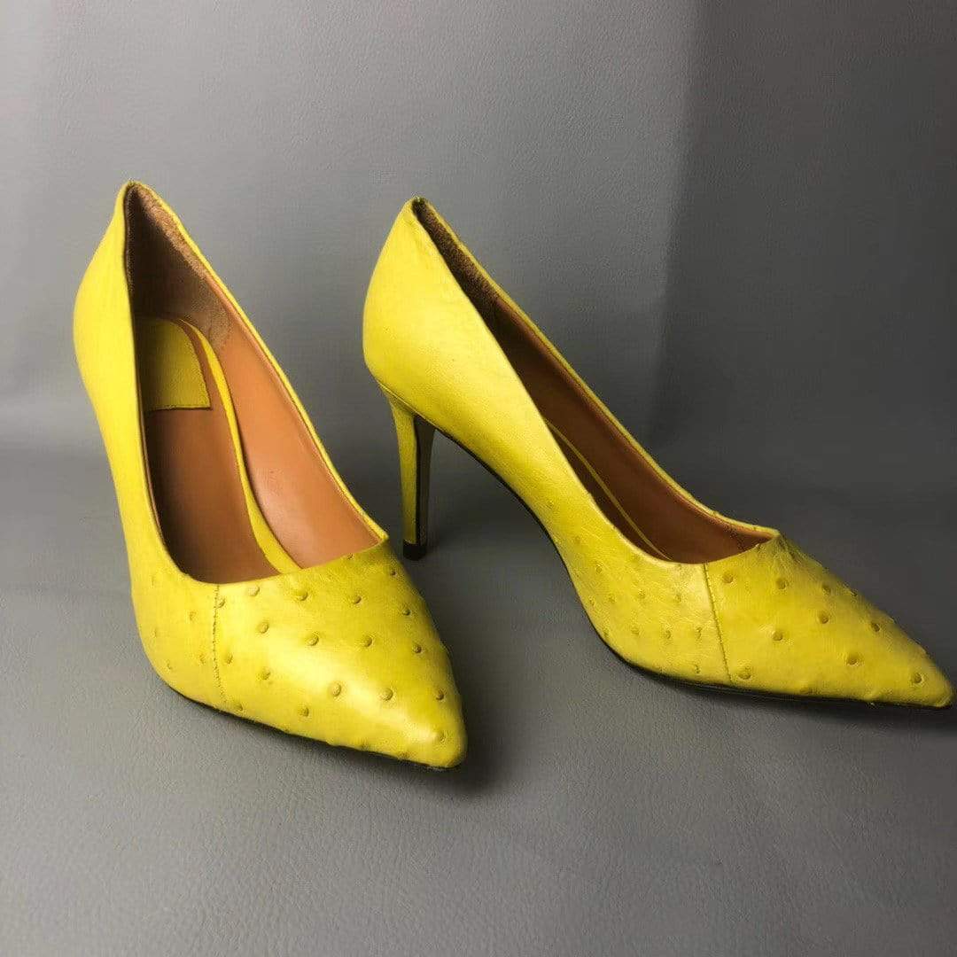Elegant women's high heels by Rossie Viren featuring crocodile and ostrich leather pumps with a stylish design.