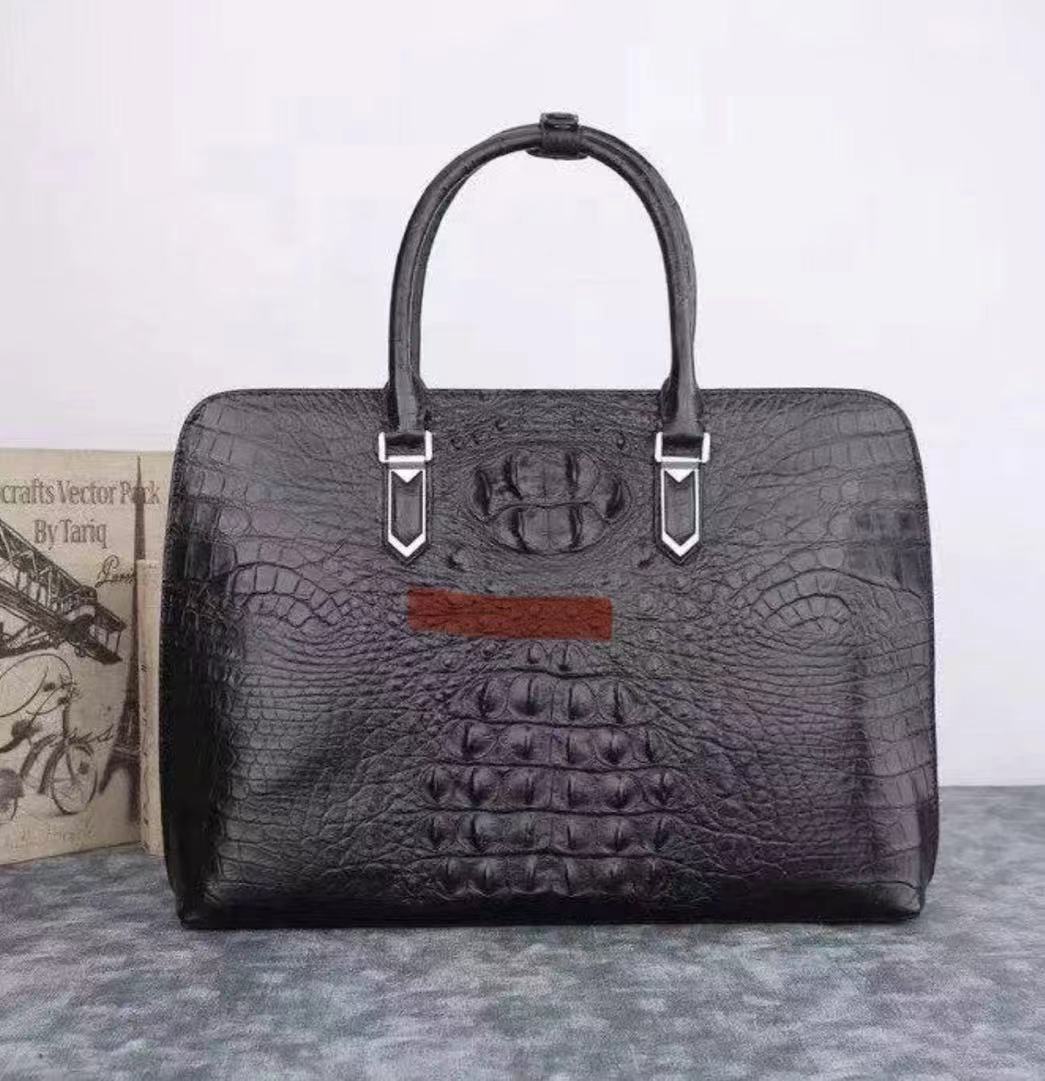 Rossie Viren crocodile leather handbag with outside logo in black, showcasing its elegant exterior and high-quality craftsmanship.