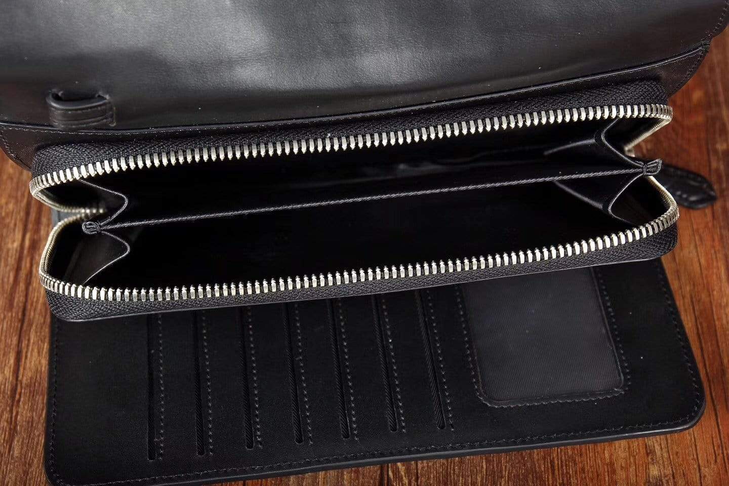 Black Crocodile Skin Belly Leather Trifold Wallet for Men by Rossie Viren, featuring a sleek, textured design and multiple card slots.