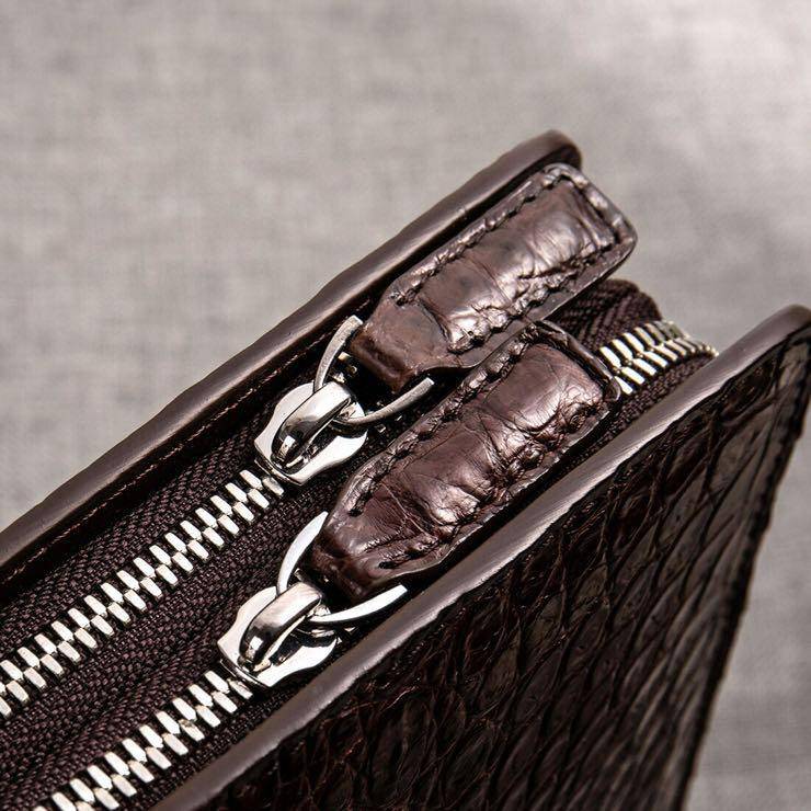 Brown men's crocodile leather briefcase handbag by Rossie Viren, designed for laptops and professional use.
