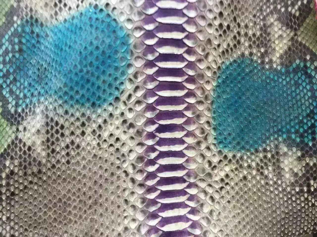 Python skin leather accessory in vibrant colorway, showcasing exotic crocodile leather textures and craftsmanship.