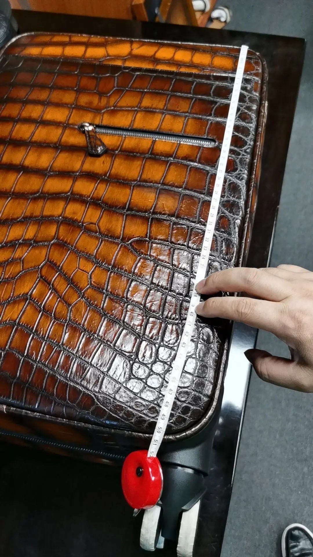 Retro brown crocodile leather trolley suitcase with universal wheels, 20-inch rollaboard travel bag by Rossie Viren.