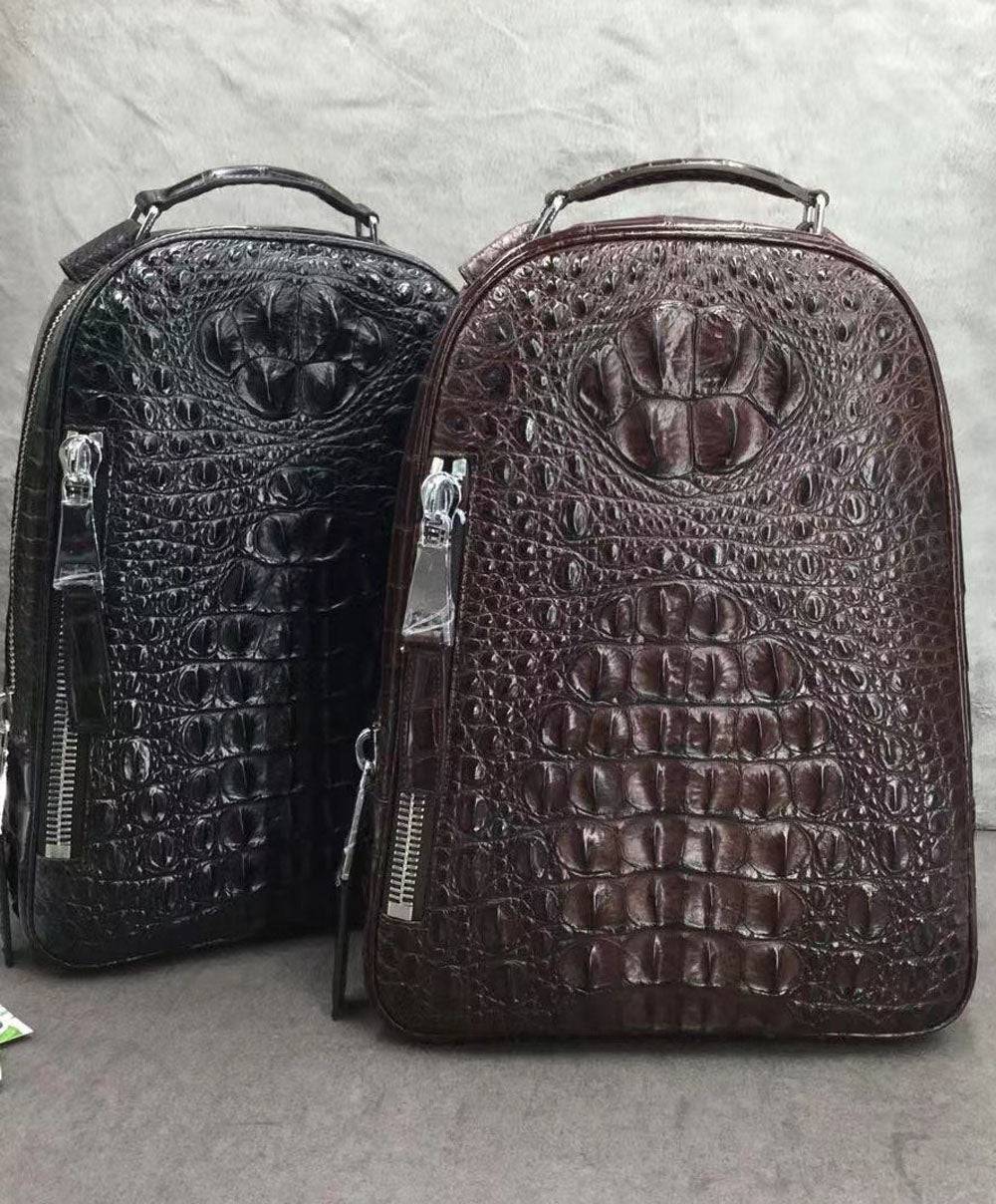 Large Rossie Viren crocodile skin leather backpack with textured crocodile pattern and sturdy leather straps.