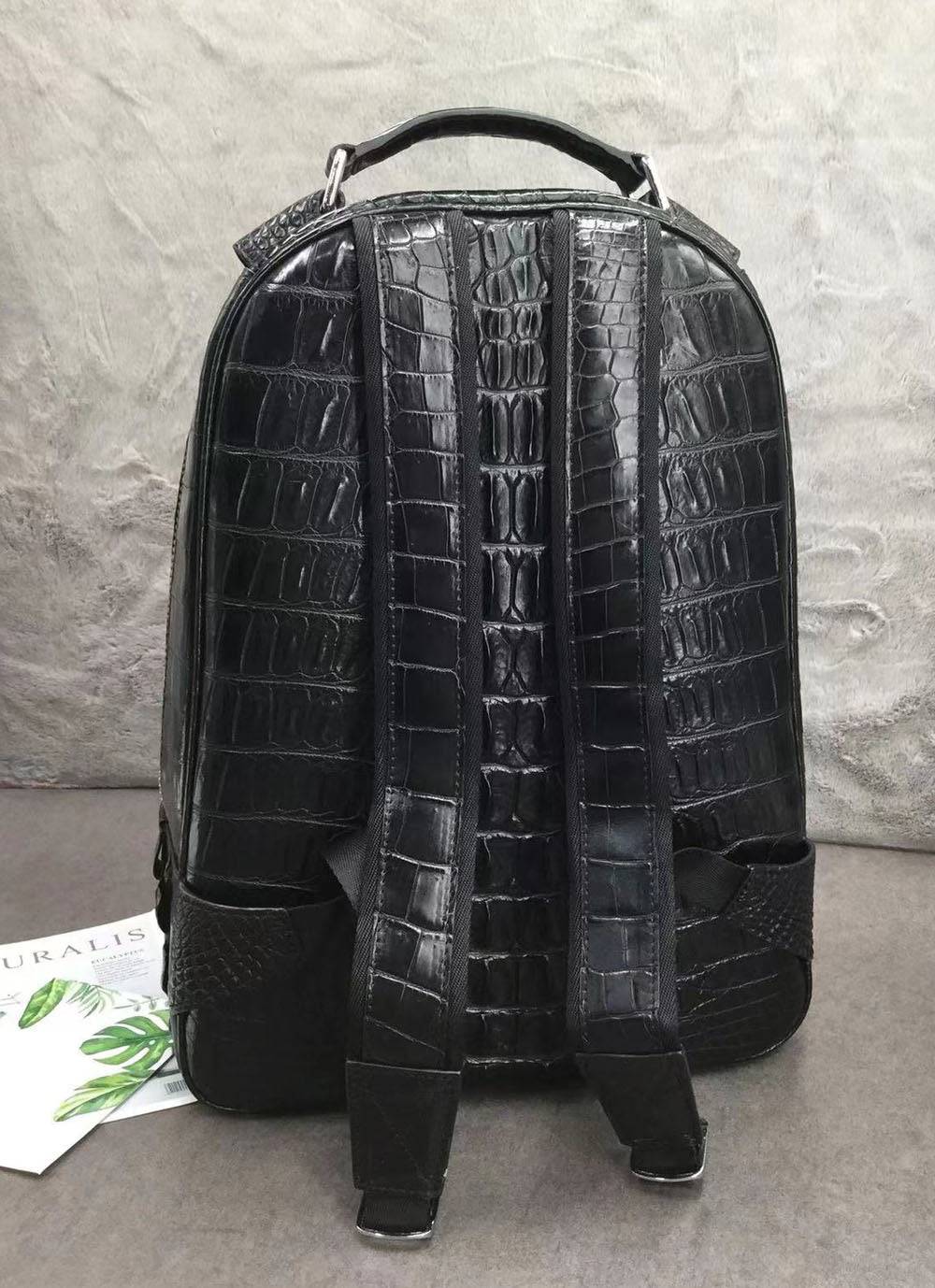 Large Rossie Viren crocodile skin leather backpack with textured crocodile pattern and sturdy leather straps.