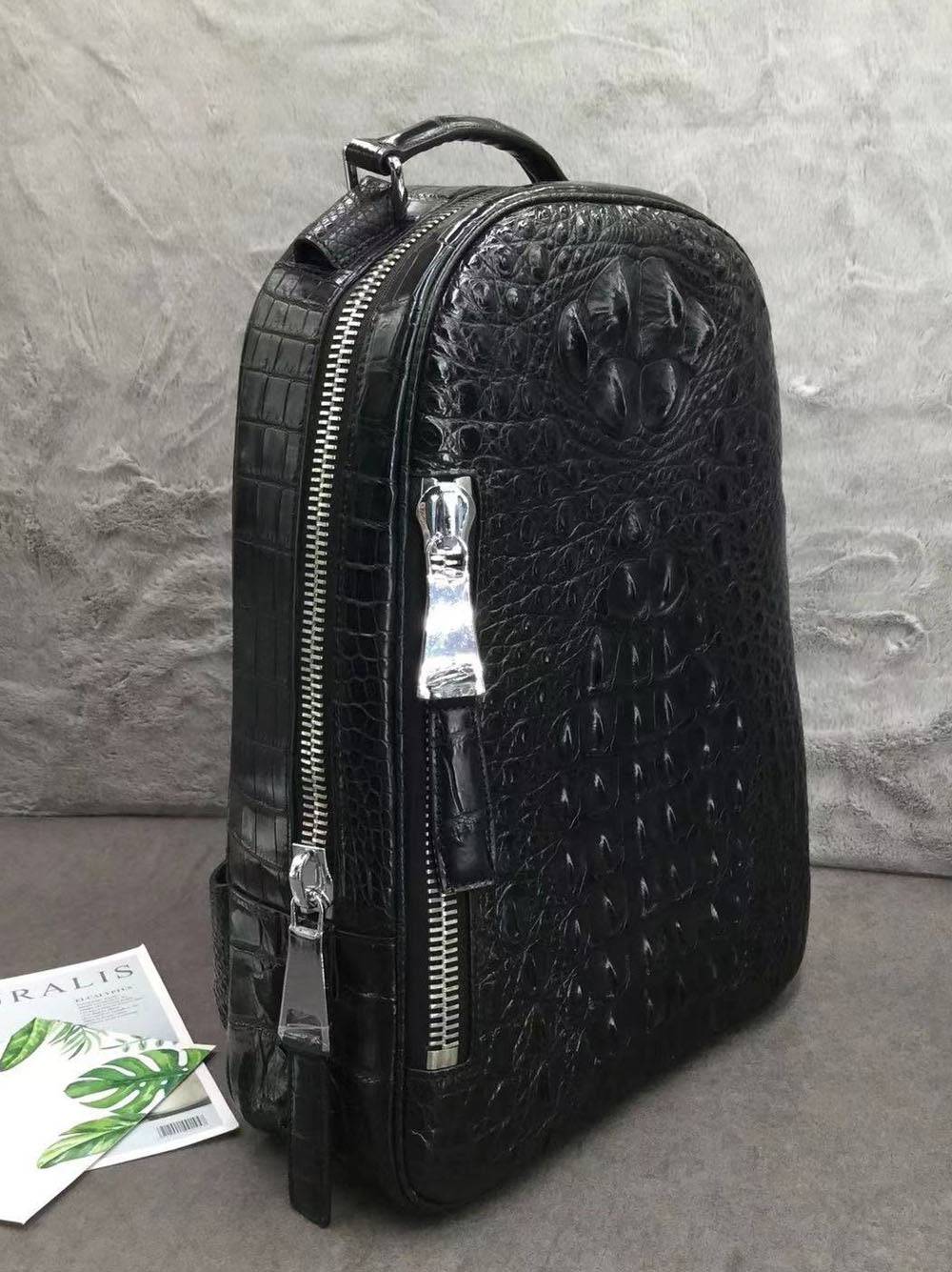 Large Rossie Viren crocodile skin leather backpack with textured crocodile pattern and sturdy straps, stylish and spacious.