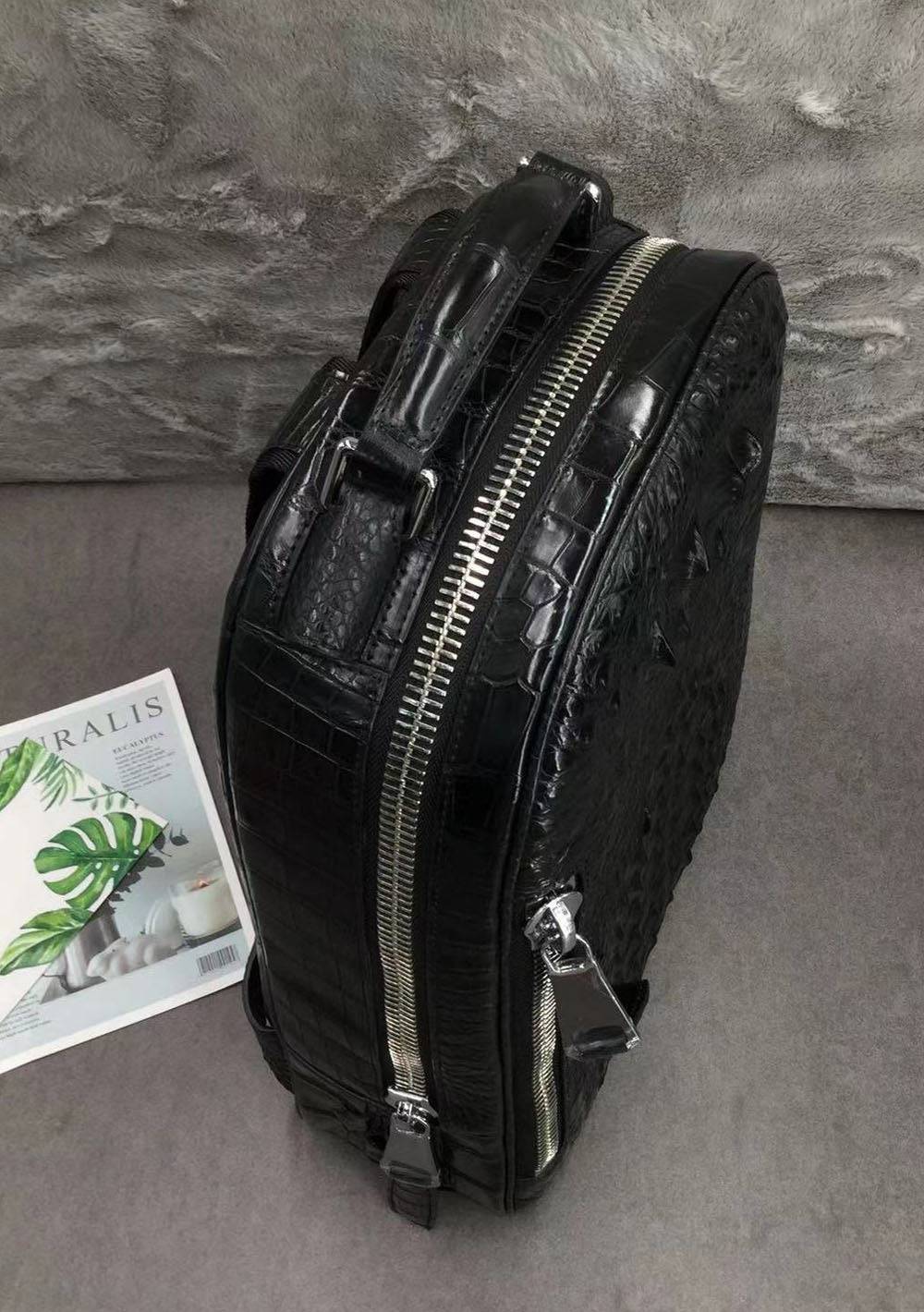 Large Rossie Viren crocodile skin leather backpack with textured crocodile pattern and sturdy leather straps.