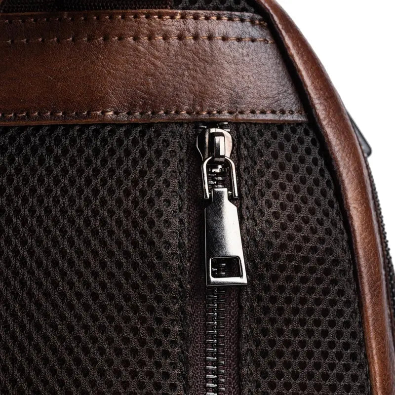 Rossie Viren women's retro genuine leather large backpack, leather rucksack with multiple compartments, suitable for office and travel.