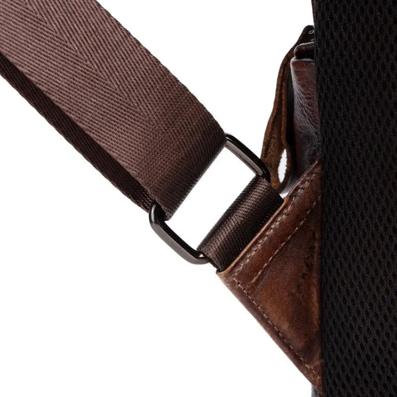 Rossie Viren women's retro genuine leather large backpack with top handle, adjustable straps, and spacious main compartment.