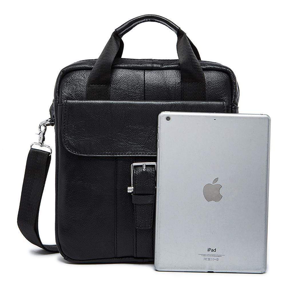Rossie Viren vertical vintage leather messenger bag for laptop and tablet, with adjustable shoulder strap and classic design.
