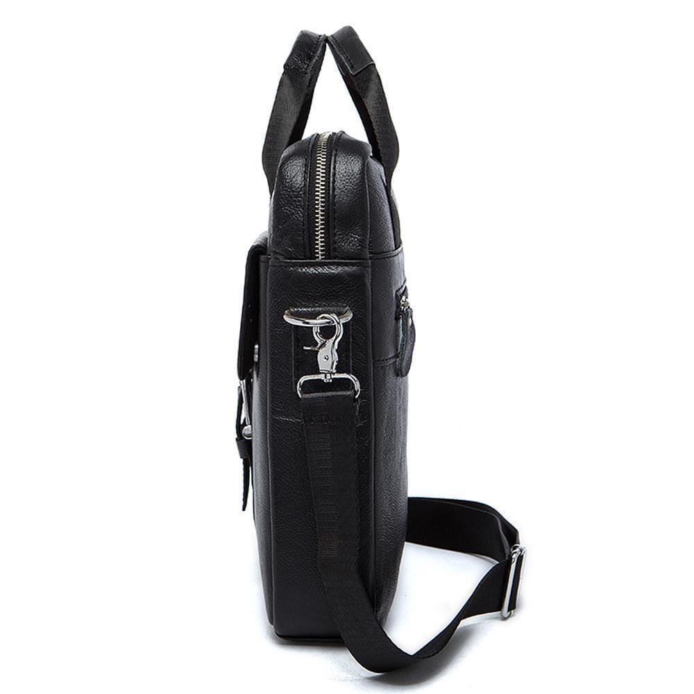 Rossie Viren vertical vintage leather messenger bag with handles and adjustable shoulder strap for laptops and tablets.