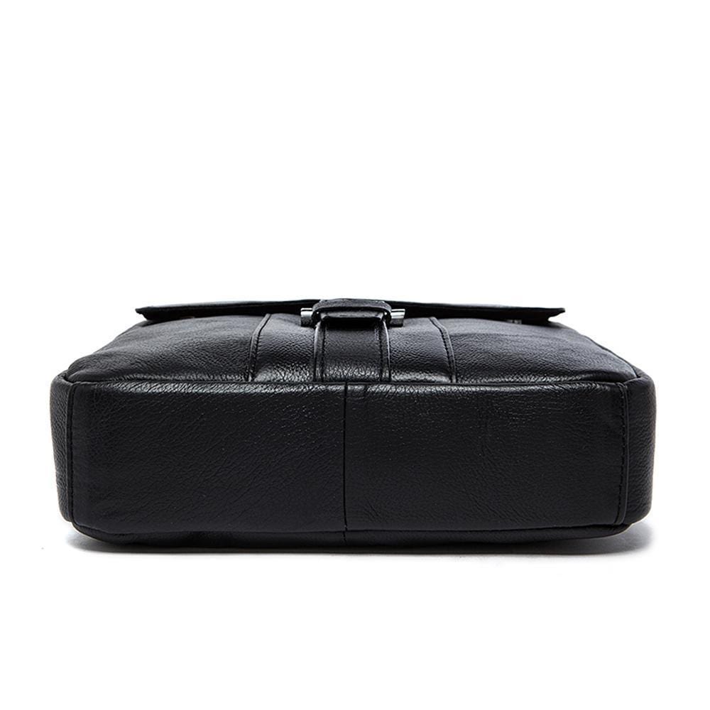Rossie Viren vertical vintage leather messenger bag for laptop and tablet, featuring classic design and durable craftsmanship.