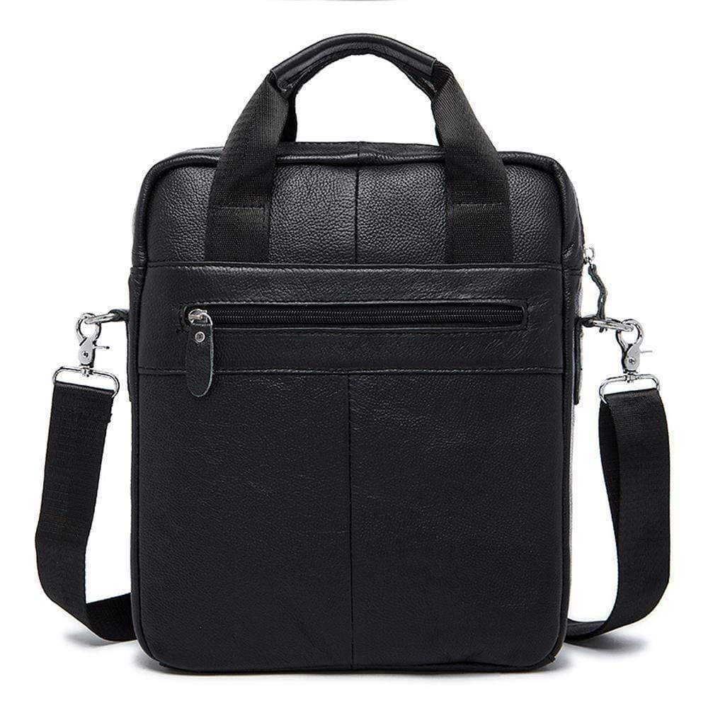Rossie Viren vertical vintage leather messenger bag with adjustable strap, designed for laptops and tablets, in brown leather.