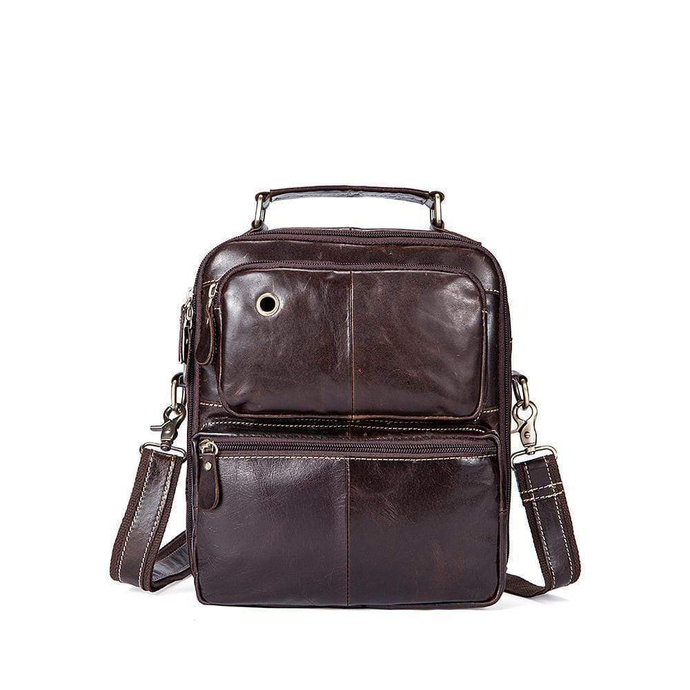 Rossie Viren vintage crossbody handbag with two front pockets, grab handle, and long shoulder strap, stylish and functional accessory.