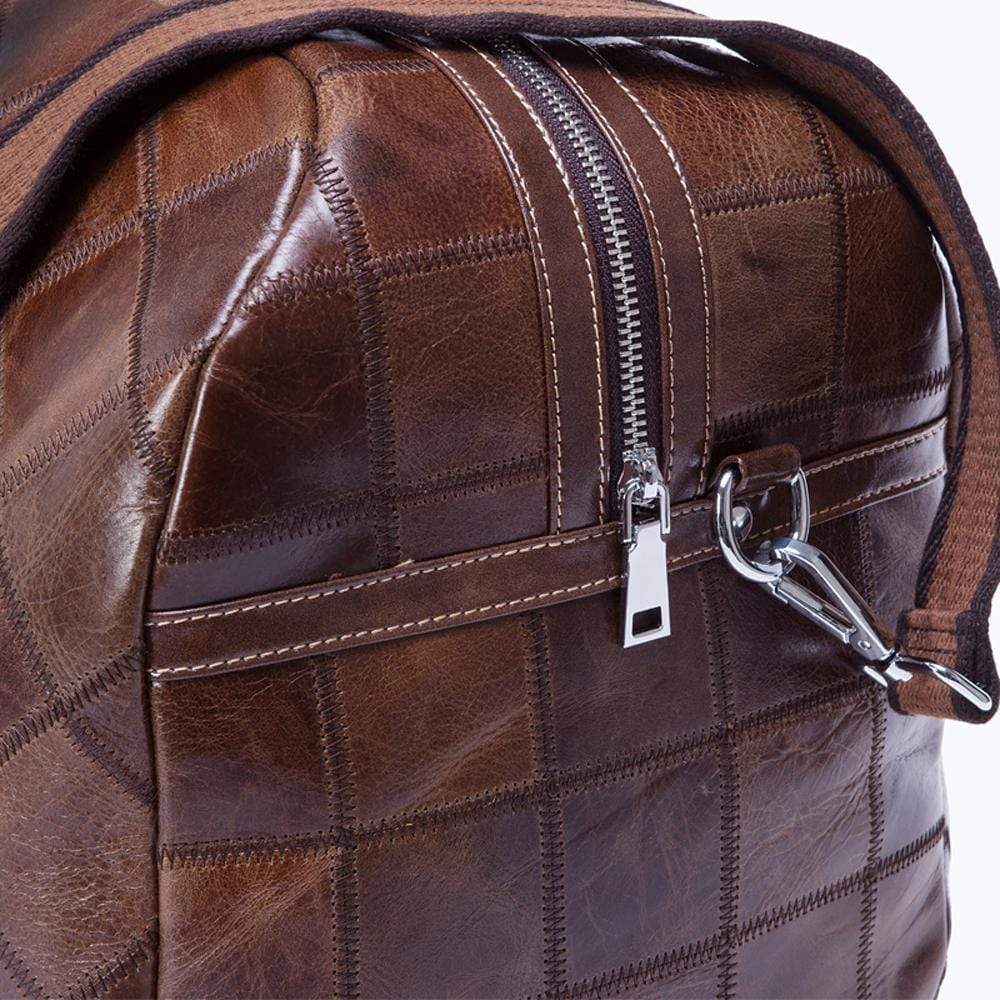 Rossie Viren vintage genuine leather quilted travel duffel bag with shoulder strap, designed for weekend or carry-on luggage.