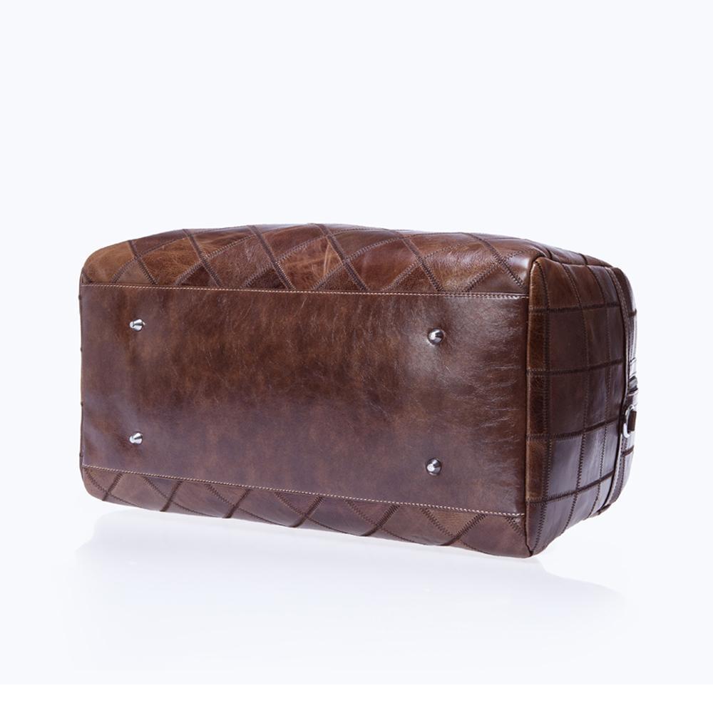 Rossie Viren vintage genuine leather quilted travel duffel bag with shoulder strap, designed for weekend carry-on luggage.