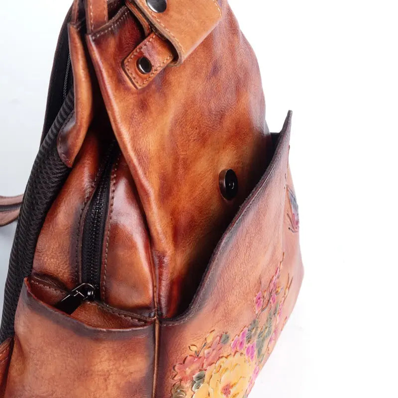 Rossie Viren vintage leather backpack for women, stylish leather rucksack with adjustable straps and spacious interior.