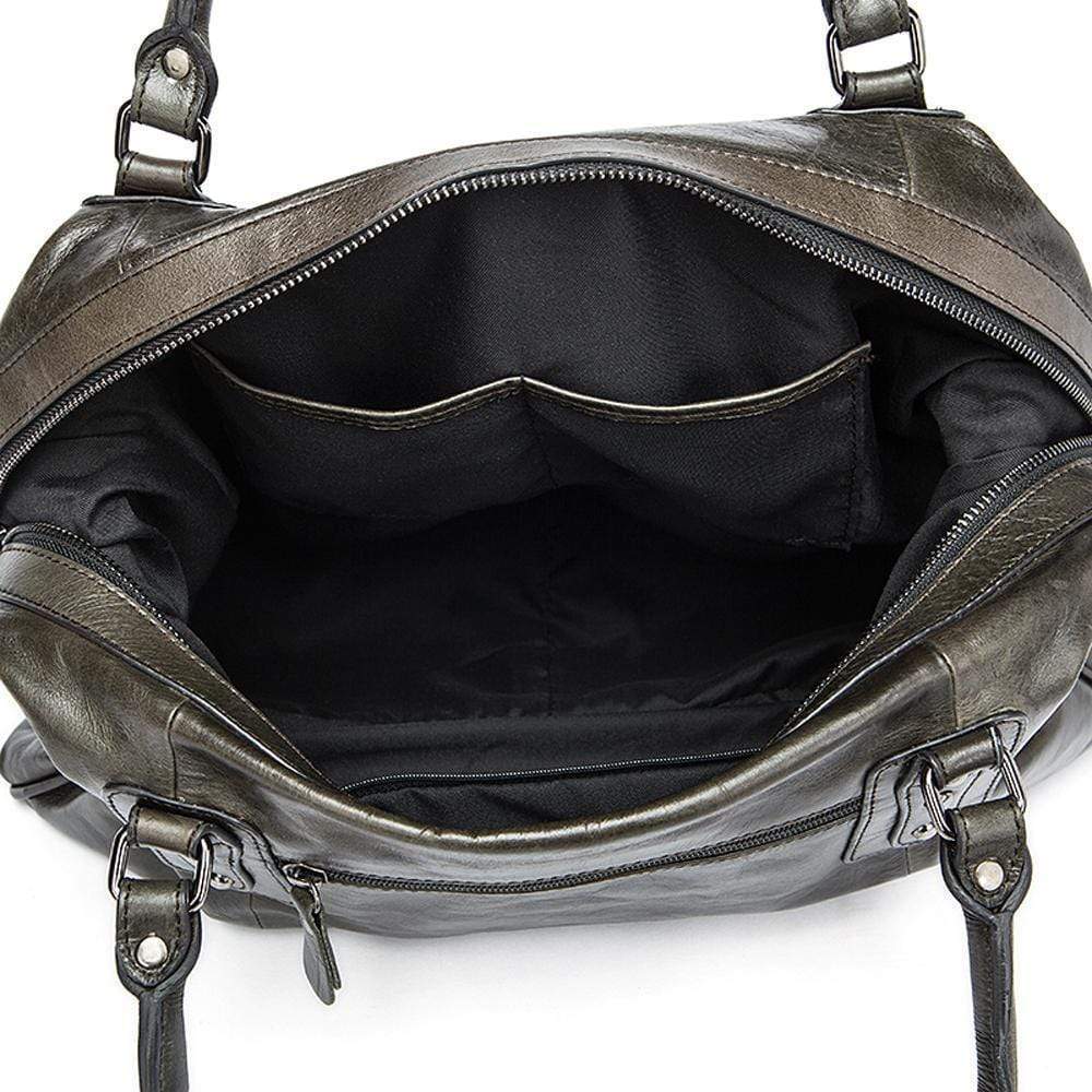 Rossie Viren vintage leather large travel carry-all unisex weekender duffel shoulder bag shown with handles and spacious interior.