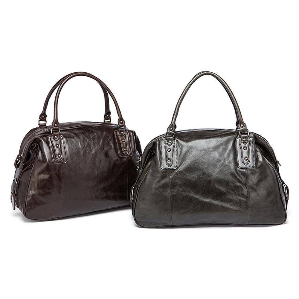 Rossie Viren vintage leather large travel carry-all unisex weekender duffel shoulder bag, showing spacious design and sturdy handles.