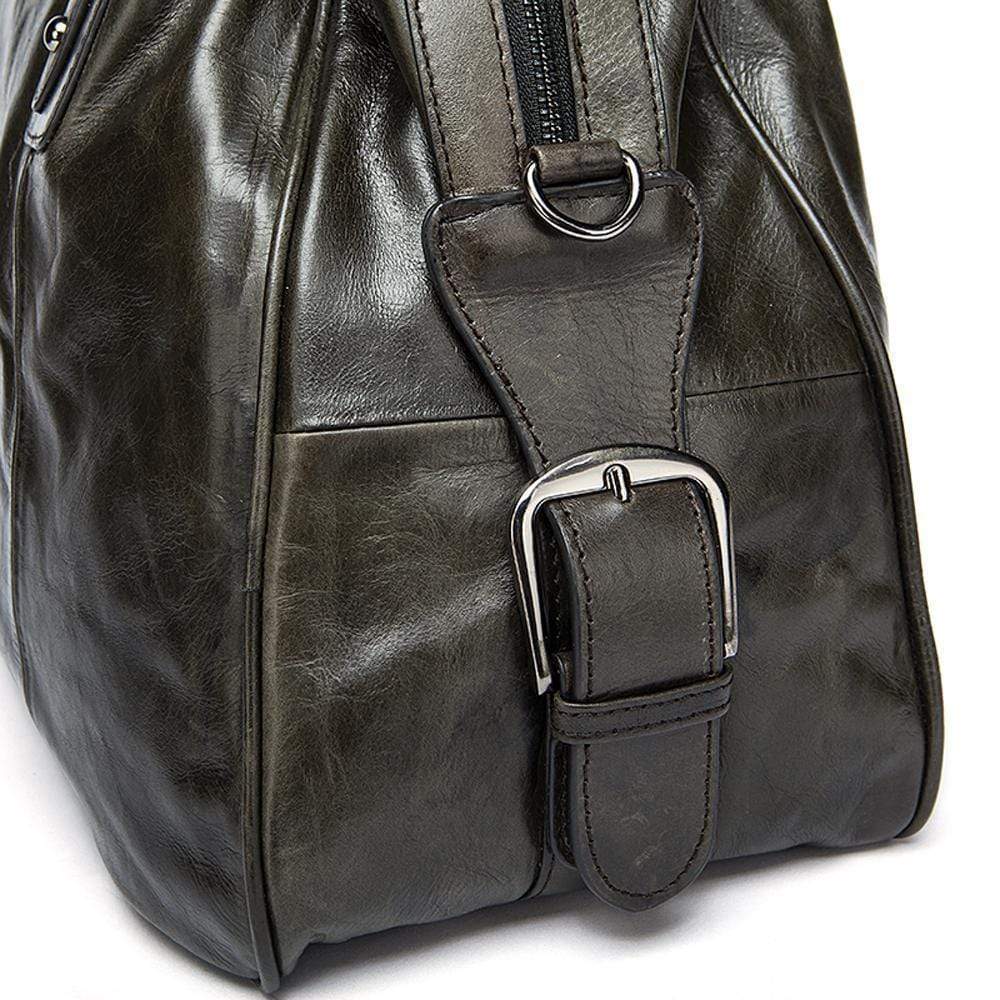 Rossie Viren vintage leather large travel carry-all unisex weekender duffel shoulder bag with sturdy handles and spacious interior.