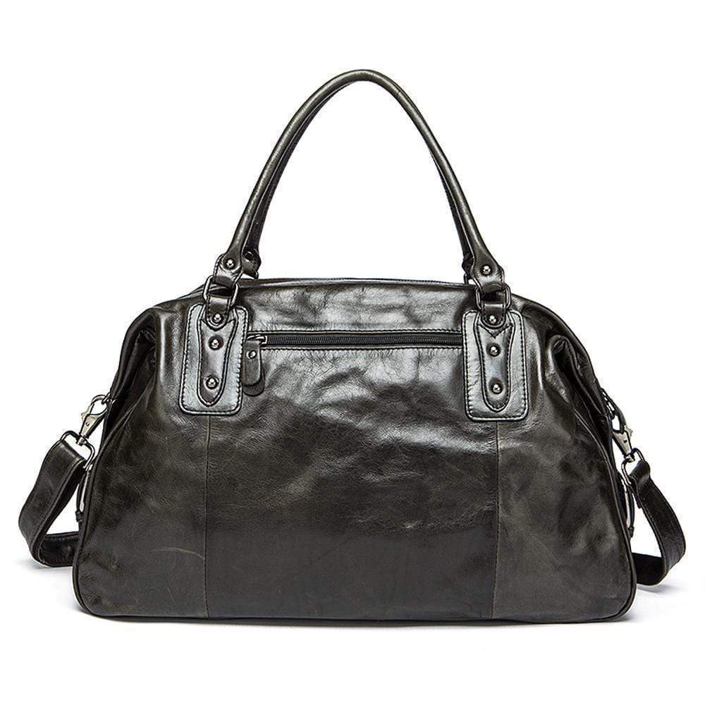 Rossie Viren vintage leather large travel carry-all duffel bag with shoulder strap and unisex design.