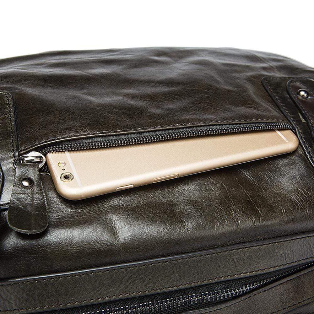 Rossie Viren vintage leather large travel carry-all unisex weekender duffel bag with shoulder strap and spacious interior.
