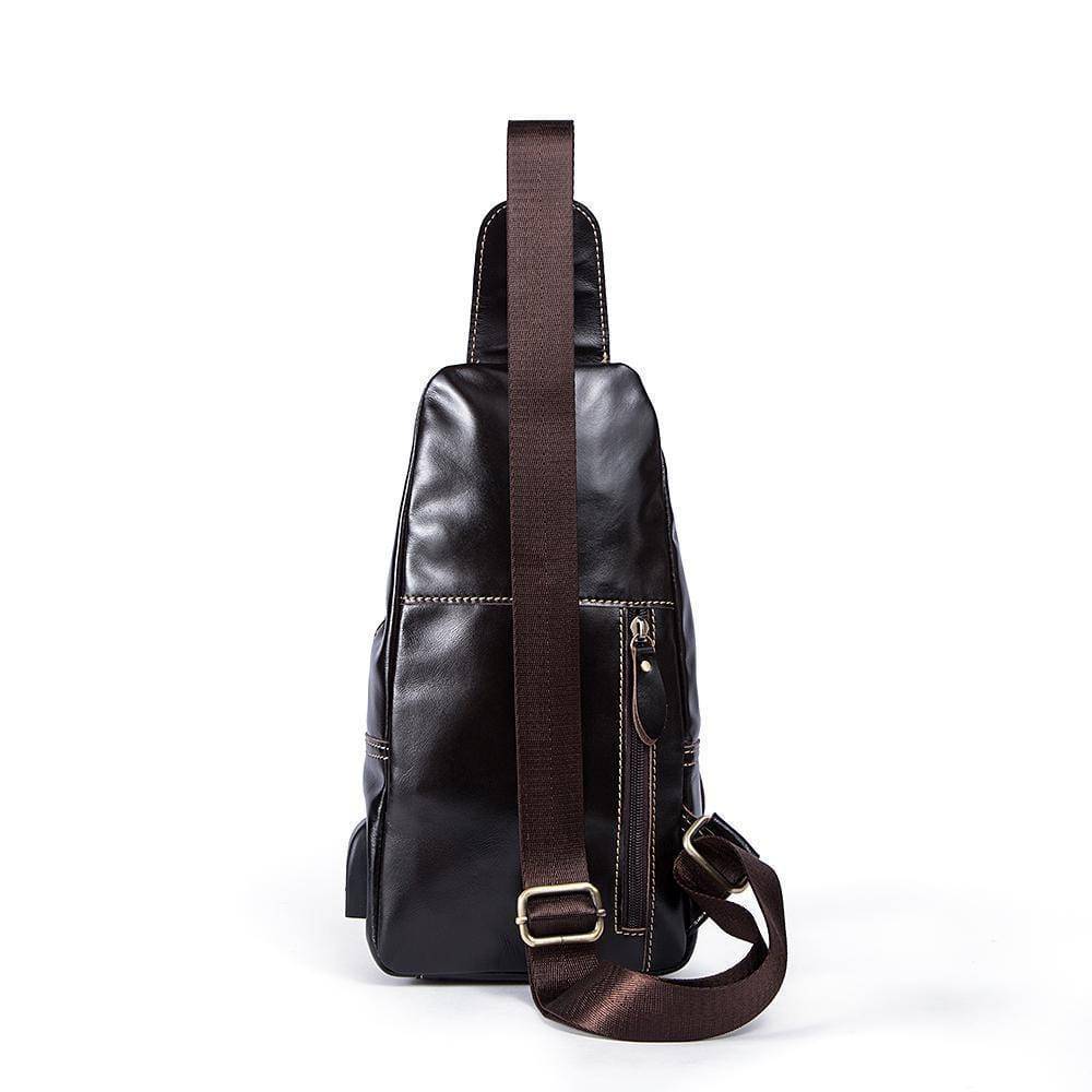 Rossie Viren vintage leather sling bag with USB charging port, crossbody design, ideal for outdoor travel and daily use.