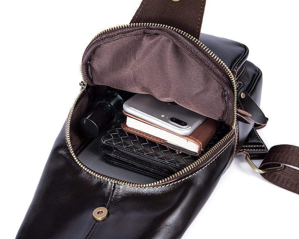 Rossie Viren vintage leather sling bag with USB charging port, crossbody style, suitable for outdoor sports and travel.
