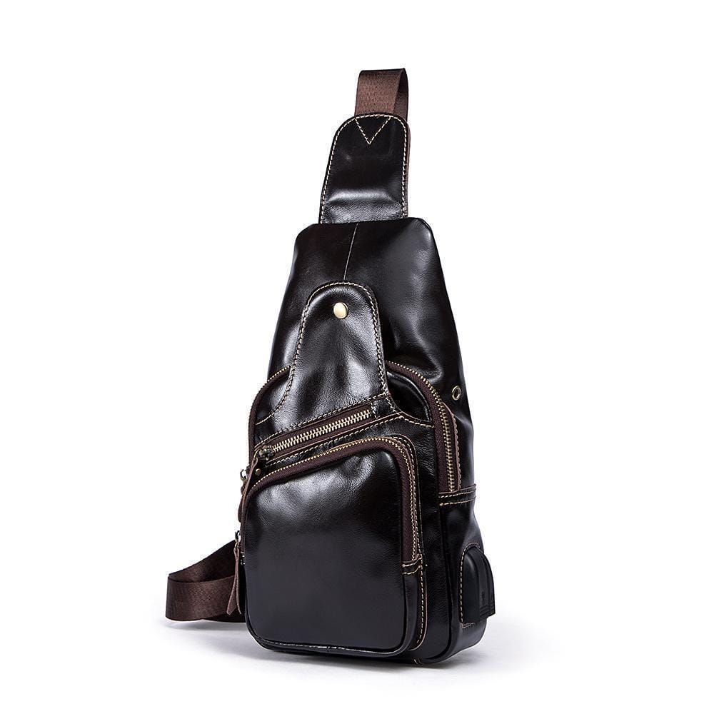 Rossie Viren vintage leather sling bag with USB charging port, crossbody design, suitable for outdoor travel and daily use.