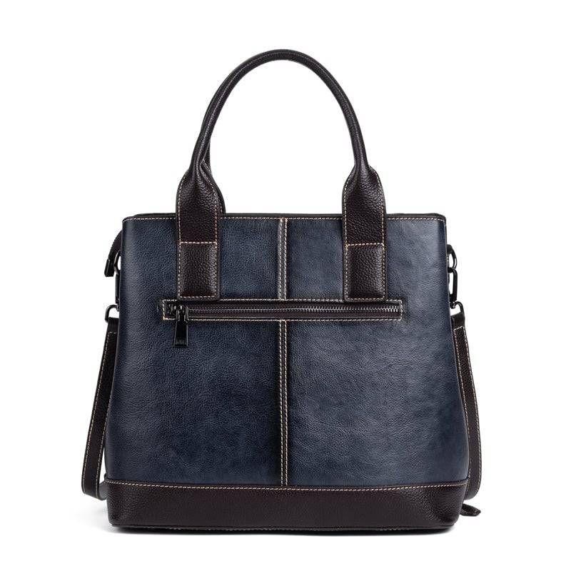 Rossie Viren women's leather handbag with top handle, crossbody strap, tote style, shoulder bag, in elegant leather.