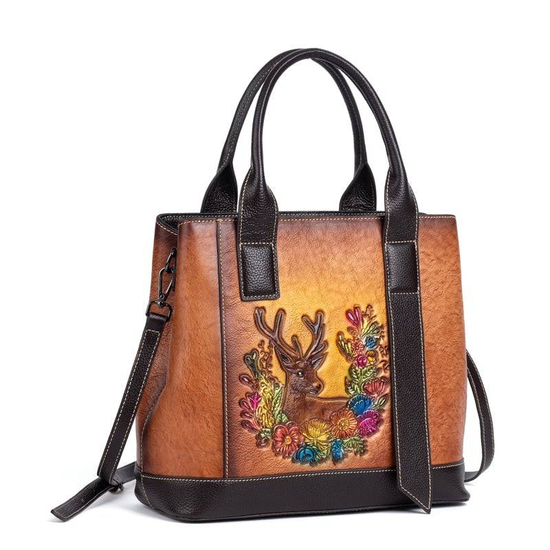 Rossie Viren women's leather handbag featuring a top handle, crossbody strap, and spacious tote design in classic leather.