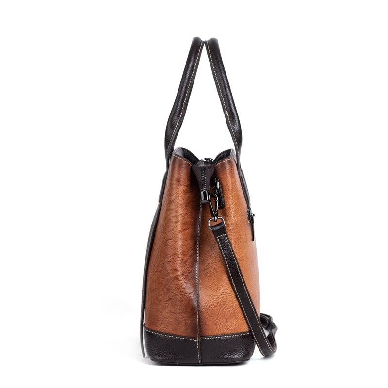 Rossie Viren women's leather handbag with top handle, crossbody strap, tote style, and shoulder bag design.
