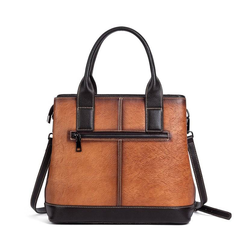 Rossie Viren women's leather handbag with top handle, crossbody strap, tote style, and shoulder bag design.