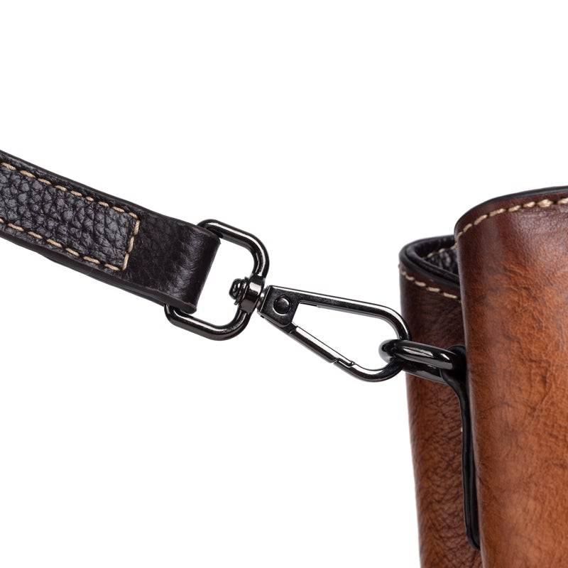 Rossie Viren women's leather handbag with top handle, crossbody strap, tote style, and shoulder bag features.