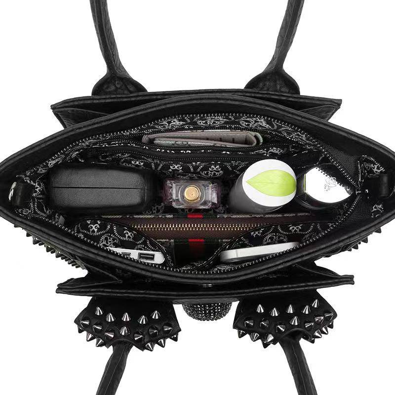 Rossie Viren 3D studded skull shopper bag with a bold skull design and sturdy handles, perfect for a stylish statement accessory.
