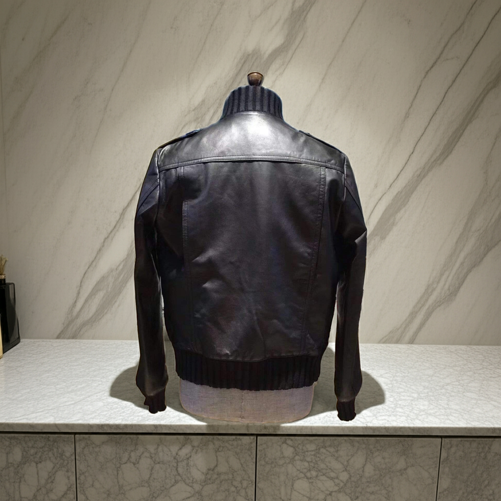 Rossie Viren crocodile leather jacket with black finish, ribbed jersey cuffs and collar, stylish and luxurious outerwear.