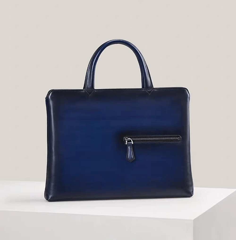Rossie Viren 15-inch vintage leather laptop briefcase handbag showing sturdy handle and classic design with secure closure