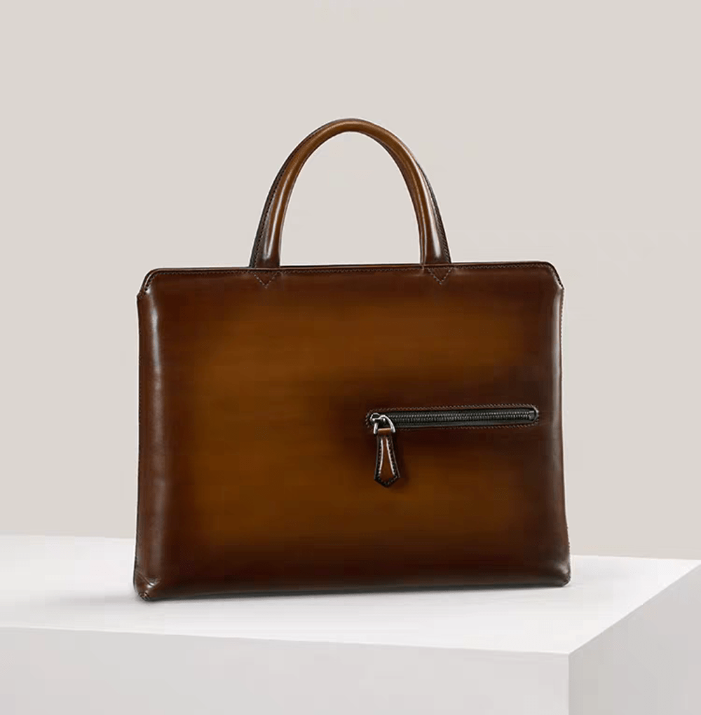 Vintage 15-inch leather laptop briefcase handbag by Rossie Viren featuring classic design and sturdy leather construction.